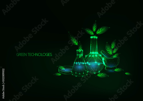 Futuristic eco friendly green technology concept with science laboratory glassware and green leaves
