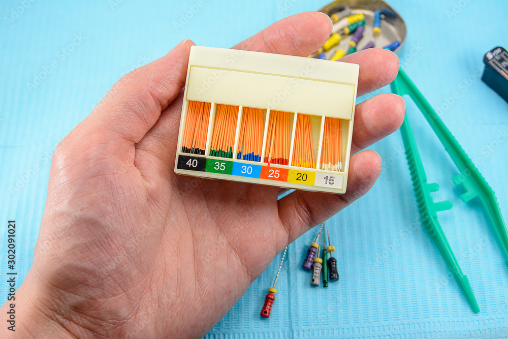 guttapercha pins in a set of different sizes for root canal filling in