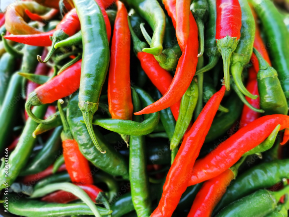 Red and green chili peppers background