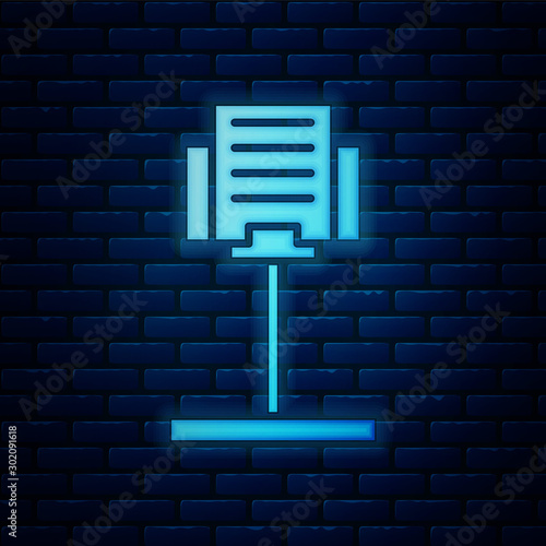 Glowing neon Music stand icon isolated on brick wall background. Musical equipment. Vector Illustration