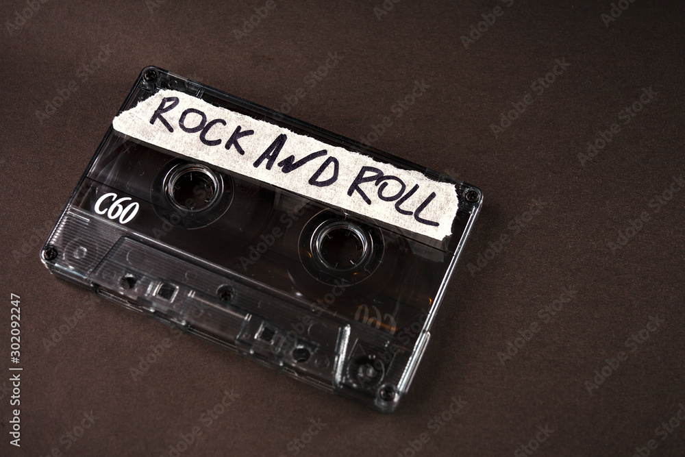 vintage old film music cassette isolated on black background with 