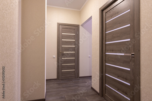 Corridor in a small apartment, closed doors