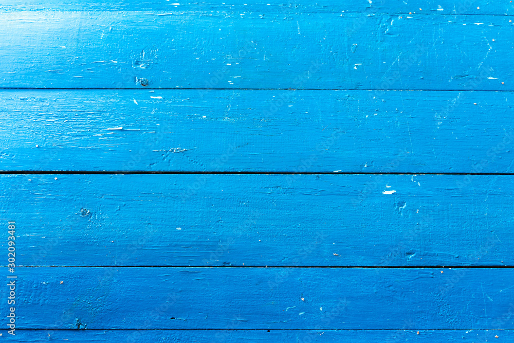 old wooden fence blue paint texture boards. Background