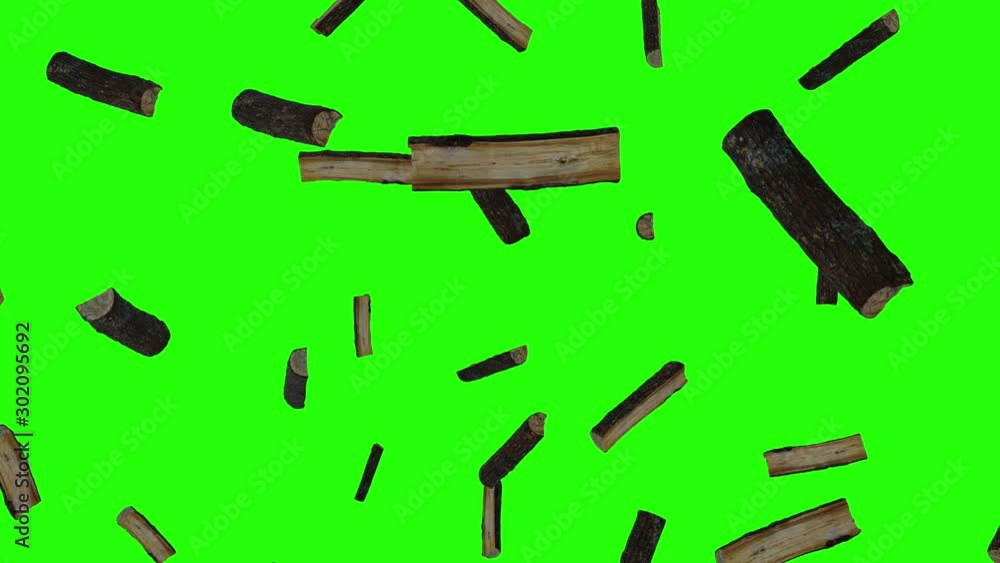Wood chips falling on green screen. Firewood trunks floating on chroma ...