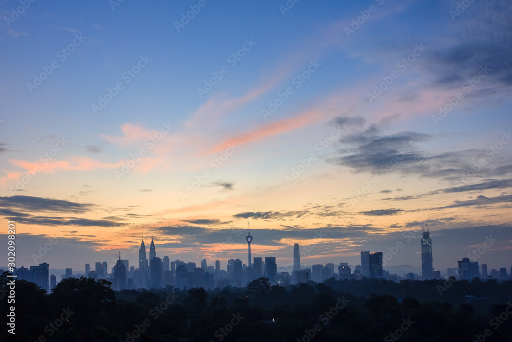 beautiful sunrise over kuala lumpur city skyline