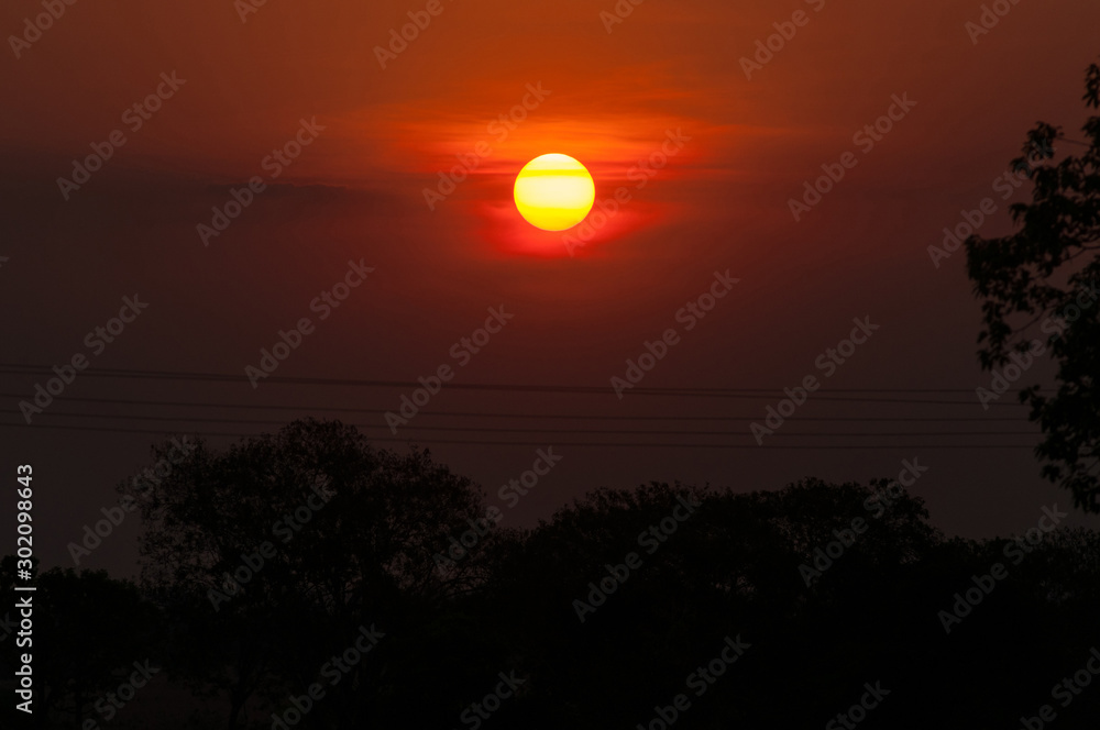 sunset in the brazilian cerrado with powerlines sunset in the brazilian cerrado with powerlines