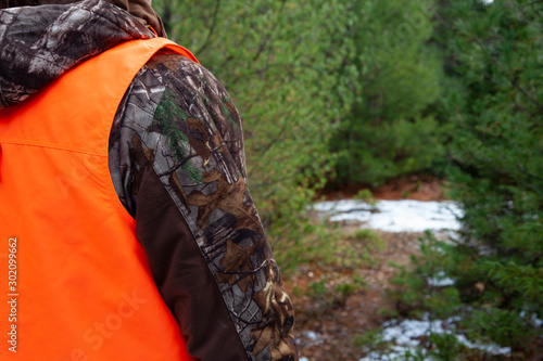 person wearing hunter orange