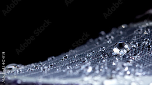 water resistant membrane fabric with water droplets photo
