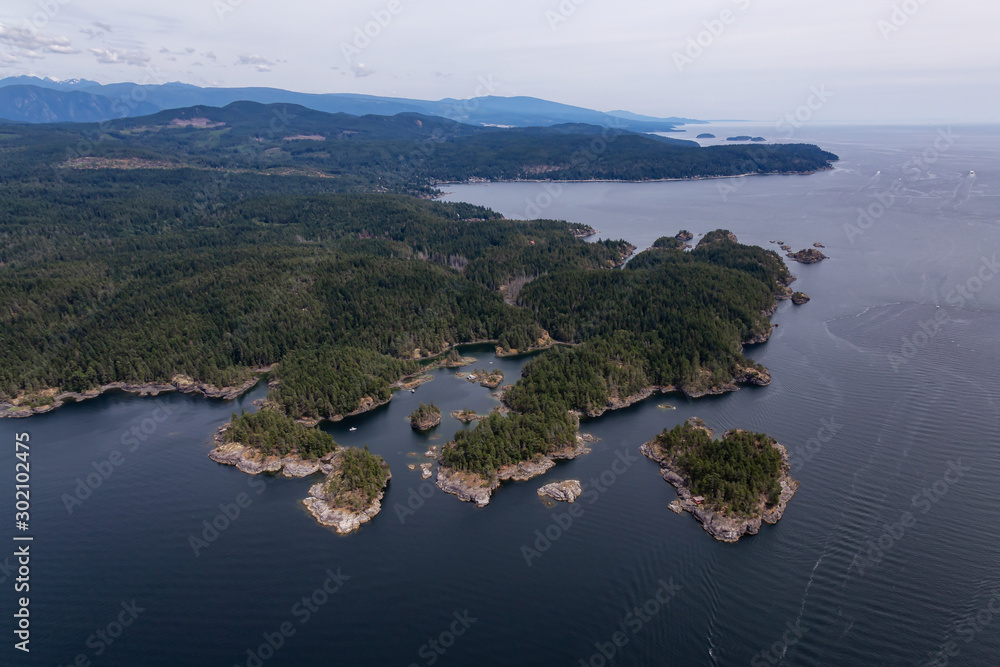 Sunshine Coast, British Columbia, Canada. Aerial View of Smuggler Cove during a sunny and hazy summer morning.