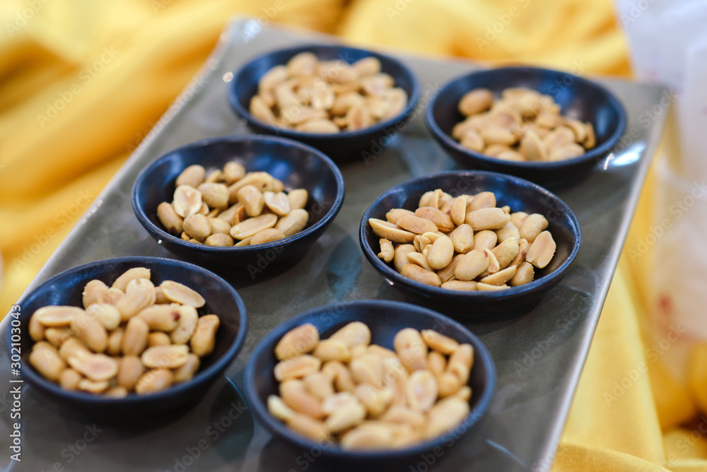 peanut in black bowl on buffet easily to take peanut in black bowl on buffet easily to take