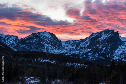 A beautiful sunset over the Rocky Mountains near Sprague Lake in Rocky Mountain National Park.