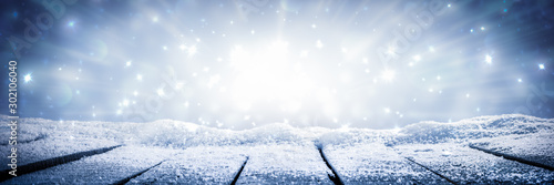 Wallpaper Mural Banner Of Wooden Plank Table With Sparkling Snow And Brilliant Explosion Background - Winter	 Torontodigital.ca