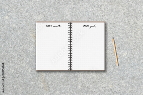 realistic 3d blank open ring spiral notebook with 2019 results, 2020 goals text lettering and wooden pencil on concrete texture background, top view flat lay, stock vector illustration clipart mockup