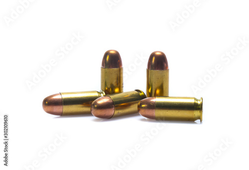 cartridges of .45 ACP pistols ammo isolated photo