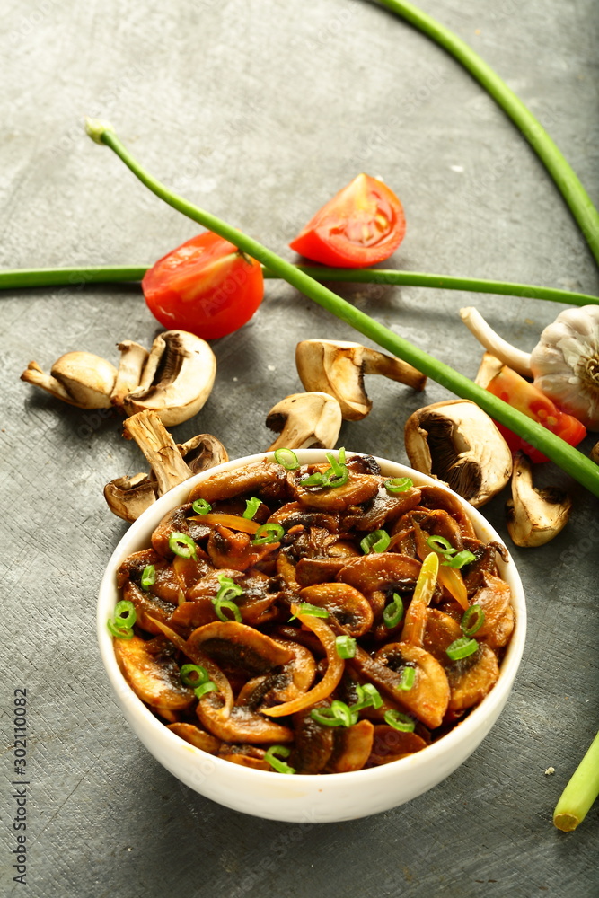 Roasted mushrooms with spices- vegan diet concepts