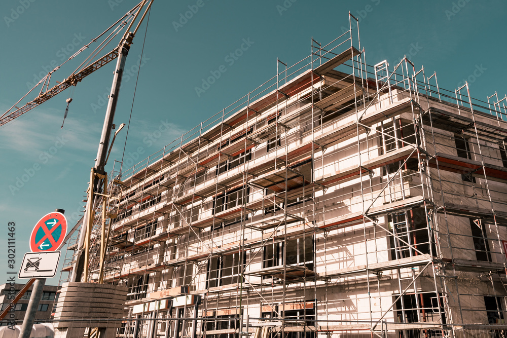 construction of the new building. Construction site background. construction of the new building. Construction site background.