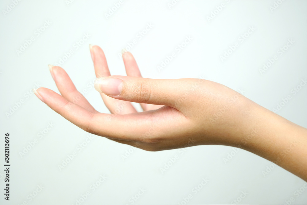 Beautiful hand of female on a white background. Concept beauty and hydration of the skin.