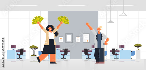 excited businesswoman holding raised dollar cash money rich business women couple standing together financial success concept modern office interior flat full length horizontal vector illustration