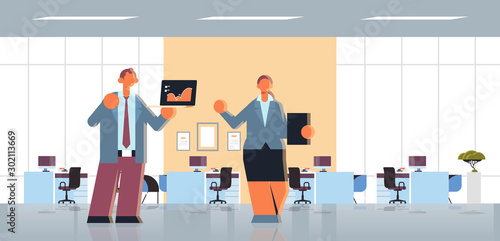 business man woman couple presenting financial diagram statistic data report coworkers with laptop and clipboard making presentation modern office interior flat full length horizontal vector
