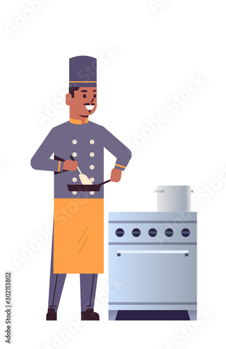 male professional chef using frying pan stirring food african american man restaurant kitchen worker in uniform standing near stove cooking concept flat full length vertical vector illustration