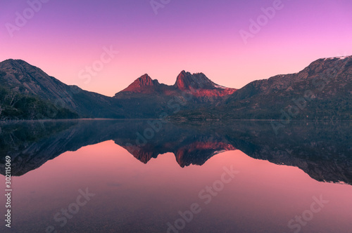Picturesque nature background with Cradle Mountain and lake at sunrise © Olga K