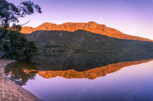 Picturesque nature background with Mountain and lake at sunrise