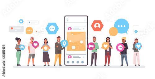 people group holding different types of communication icons mix race men women standing together near smrtphone screen online mobile app social network concept full length horizontal vector photo