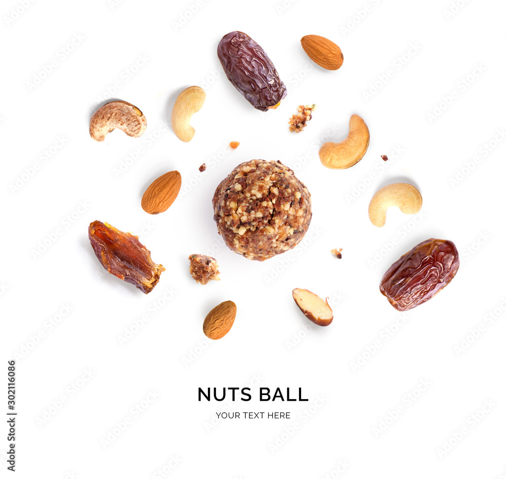 Creative layout made of nuts ball on the white background. Flat lay. Food concept. Macro concept. Creative layout made of nuts ball on the white background. Flat lay. Food concept. Macro concept.