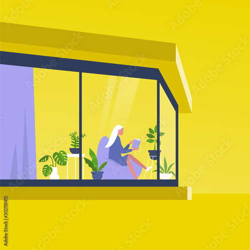 Young female character reading a book in front of the window inside a modern house, outside view