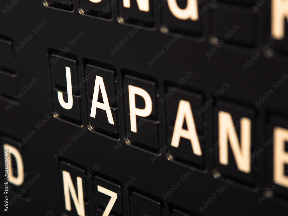 Obraz premium Signs name of Japan country on black directory board. Used for For currency exchange, airport, business, finance or travel concept, Signs and symbols.