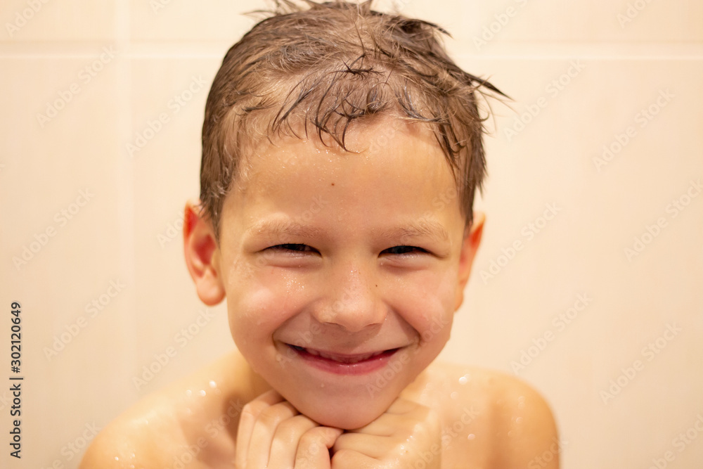 happy 6 year old boy in the bathroom. loss of children's teeth. happy 6 year old boy in the bathroom. loss of children's teeth.