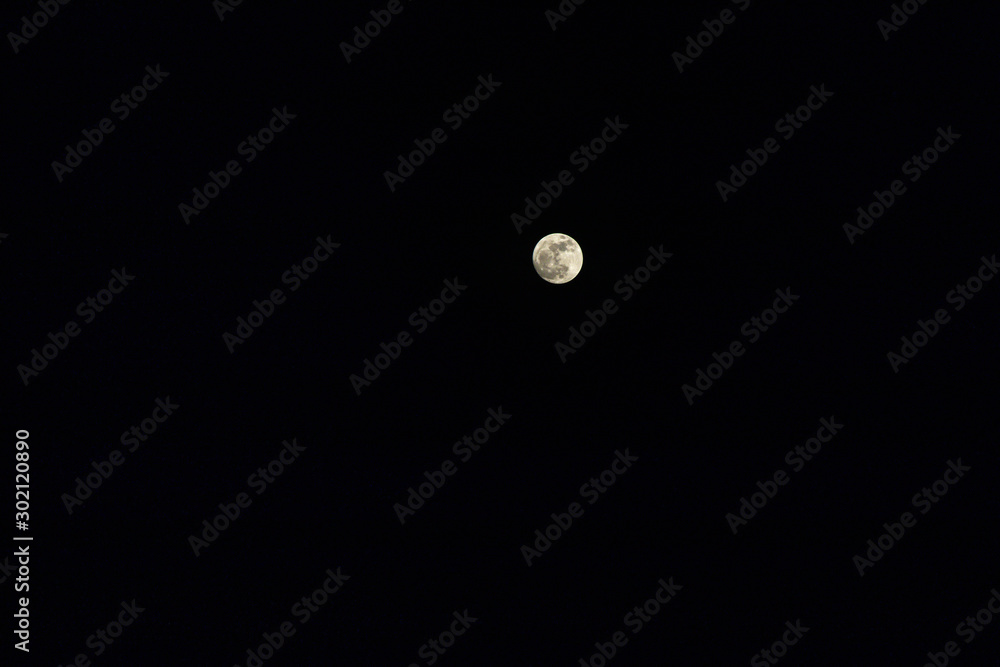 Full moon in the sky.Moon in black background. Full moon in the sky.Moon in black background.