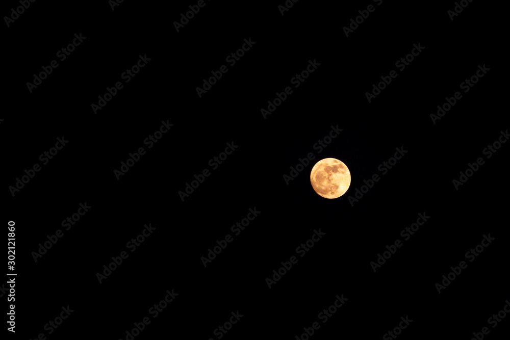 Full moon in the sky.Moon in black background. Full moon in the sky.Moon in black background.
