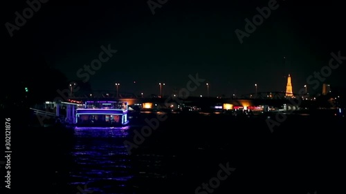 Wallpaper Mural Slow Motion. ChaoPrya River. Boats slowly sail on the night river Chao Phraya in Bangkok. Torontodigital.ca