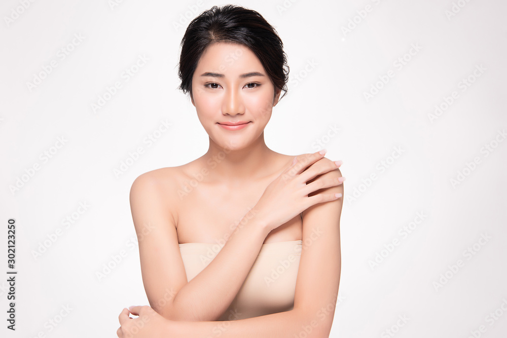 Beautiful Young Asian Woman hand Touching on Shoulder. Clean and Fresh skin, isolated on white background,Beauty Cosmetology Concept, Beautiful Young Asian Woman hand Touching on Shoulder. Clean and Fresh skin, isolated on white background,Beauty Cosmetology Concept,