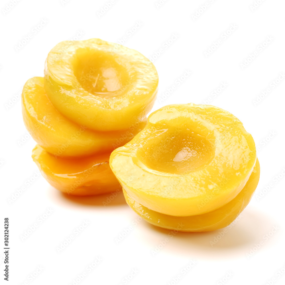 peaches in syrup on a white background peaches in syrup on a white background