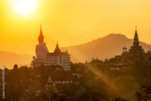 goleden light in the morning of five buddhas at wat pha sorn kaew, in thailand