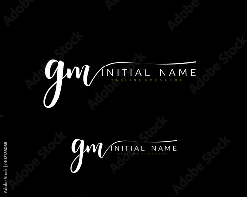 G M GM Initial handwriting logo vector. Hand lettering for designs.