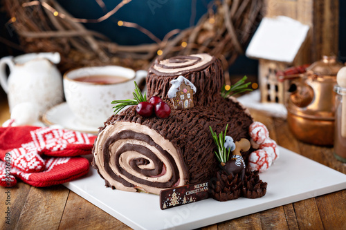 Canvas-taulu Christmas Yule log cake with edible sweet mushrooms and pine cones