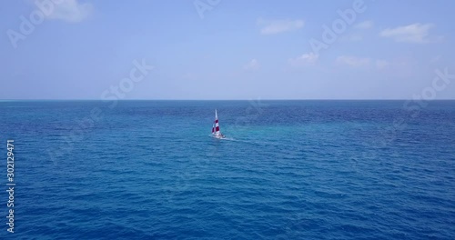 Wallpaper Mural Wonderful View of Sailing Boat in the Vast Blue Ocean With Cloudly Sky in Japan - Wide Shot Torontodigital.ca
