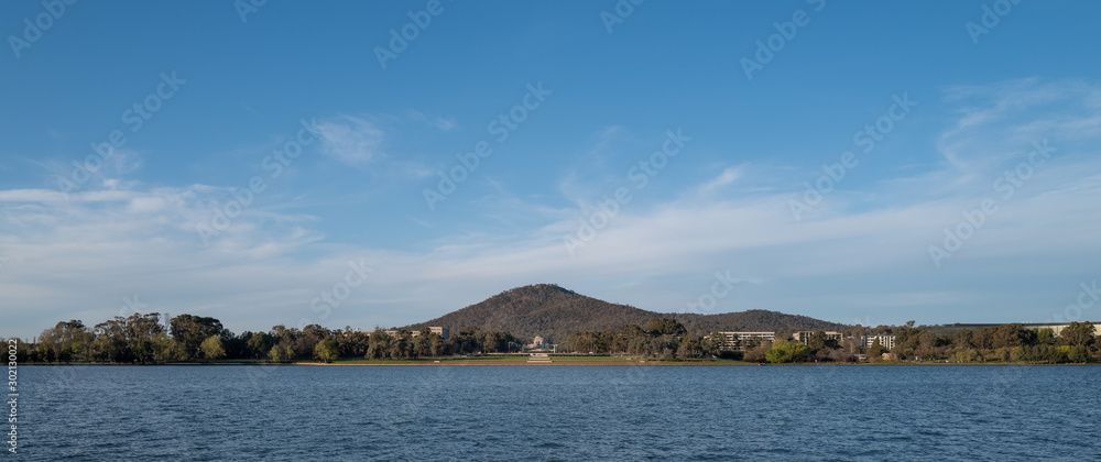 The Australian War Memorial in distance with Lake Burley Griffin in foreground, Canberra, ACT