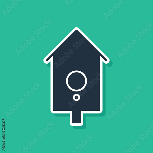 Blue Retro wall watch icon isolated on green background. Cuckoo clock sign. Antique pendulum clock. Vector Illustration