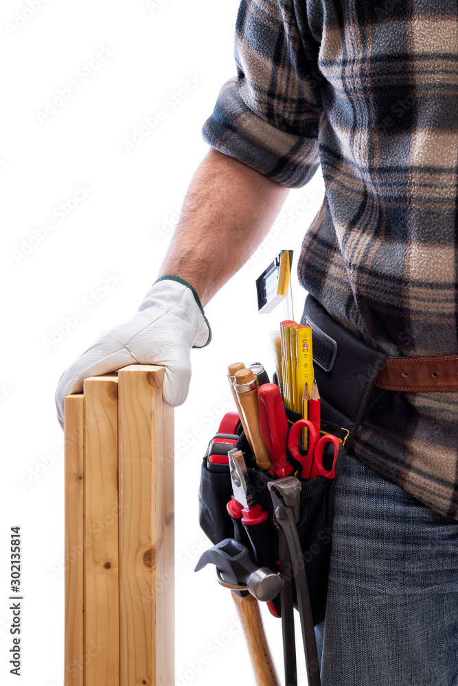 Carpenter isolated on a white background; he wears leather work gloves, he is holding wooden boards. Work tools industry construction and do it yourself housework. Stock photography.
