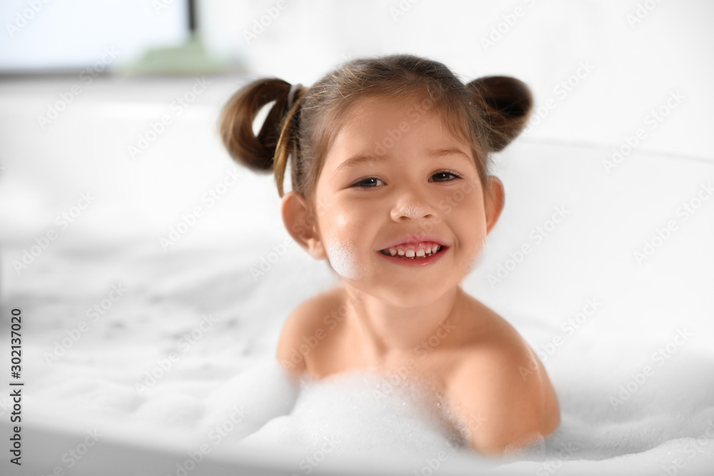 Cute little girl taking bubble bath at home Stock Photo Adobe Stock