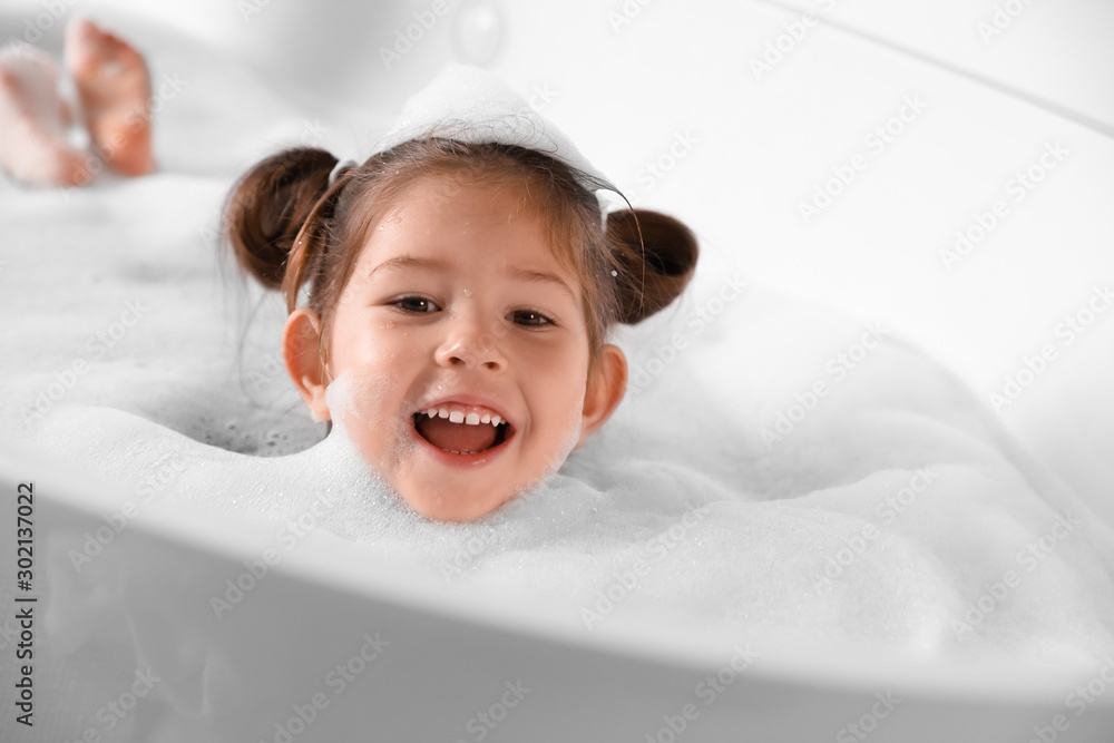 Cute little girl taking bubble bath at home Stock Photo Adobe Stock