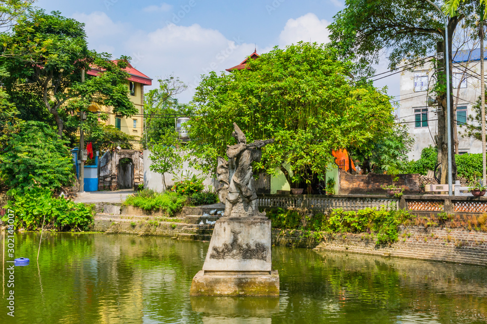 Statue of general Cao Lo at Cao Lo shrine in ancient Co Loa citadel, Vietnam. Co Loa was capital of Au Lac, the country was founded by Thuc Phan (An Duong Vuong) about 2nd century BC. Statue of general Cao Lo at Cao Lo shrine in ancient Co Loa citadel, Vietnam. Co Loa was capital of Au Lac, the country was founded by Thuc Phan (An Duong Vuong) about 2nd century BC.