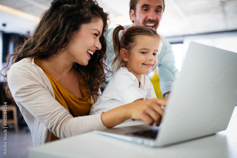 Family, children, happiness technology and home concept. Happy family together Family, children, happiness technology and home concept. Happy family together