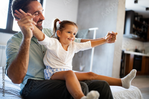 Father and daughter spending time together at home