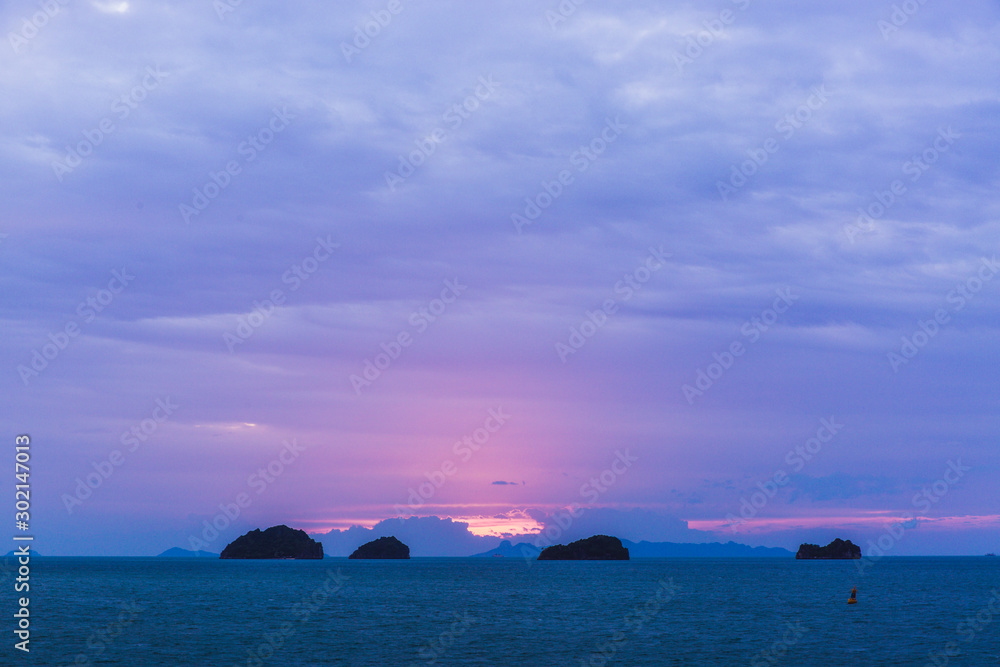 Beautiful sea sunset with pink colors with clouds