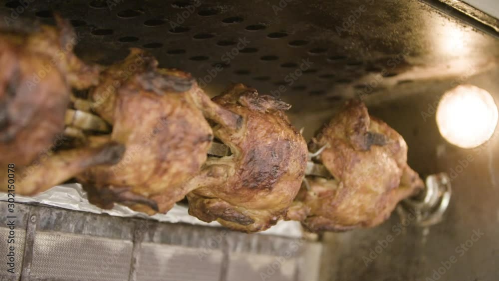 Close up of whole chicken rotisserie Close up of whole chicken rotisserie